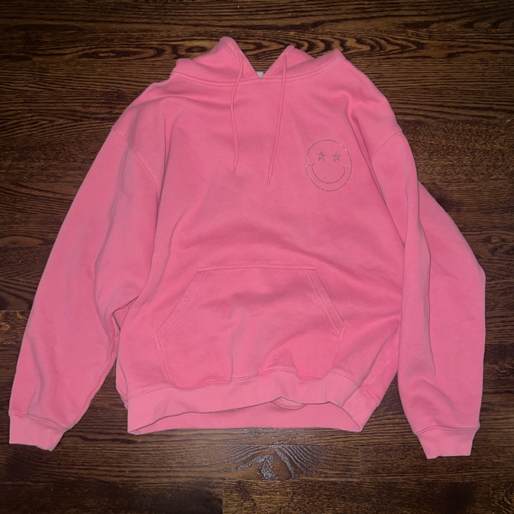 star fit pink hoodie with gem stone smiley face